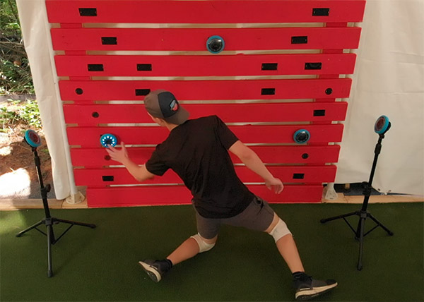 a goalie reacting to a light board